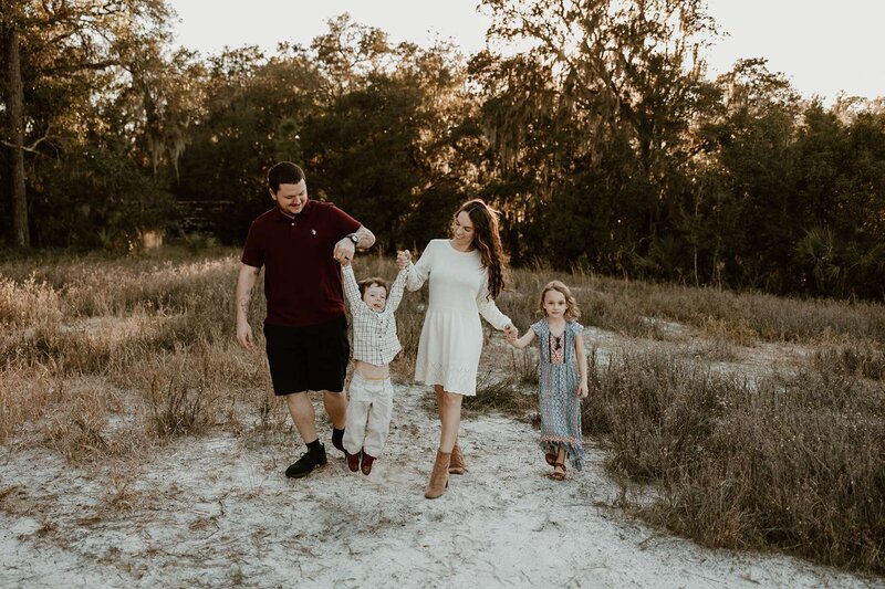 chuck ray and his family walk together