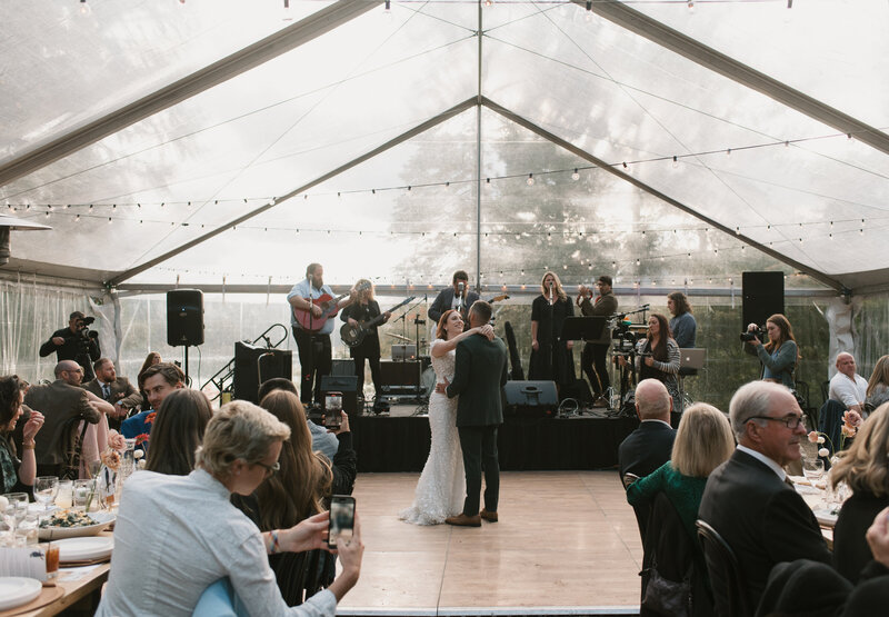 bride and groom's first dance with a live band