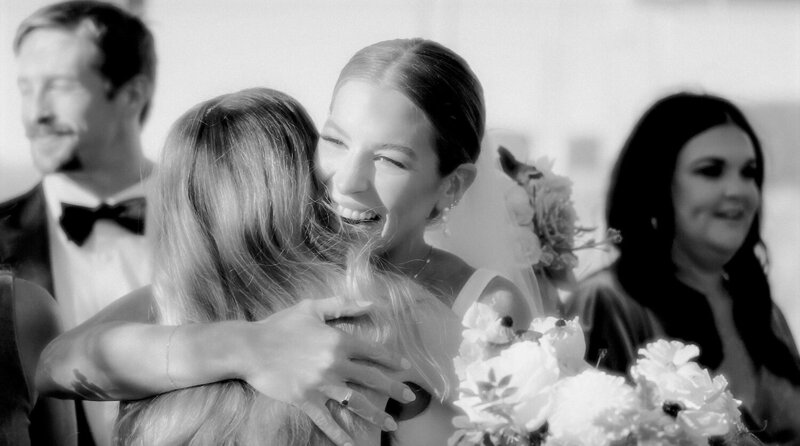 bride hugging her mother