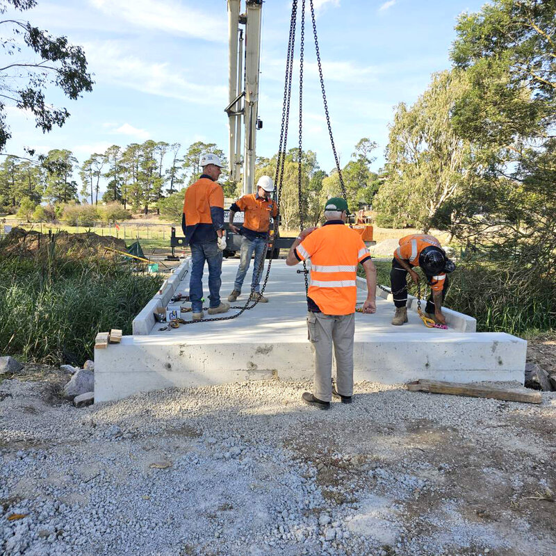 Personal trainers standing on road