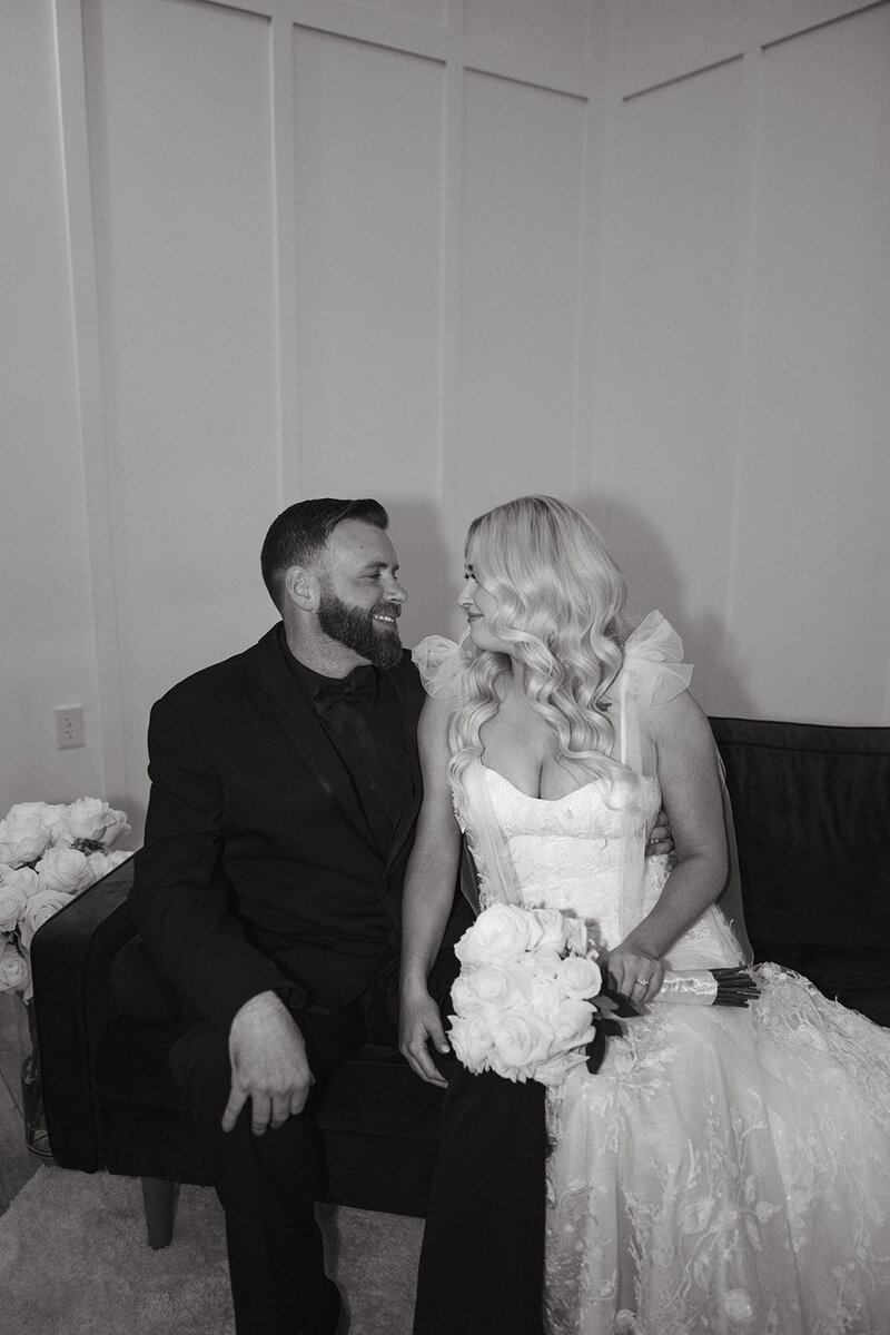 Bride and Groom seated together on wedding day