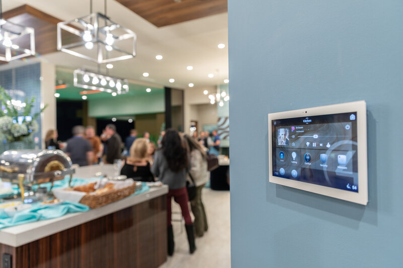 Kitchen with wall-mounted smart home touchscreen