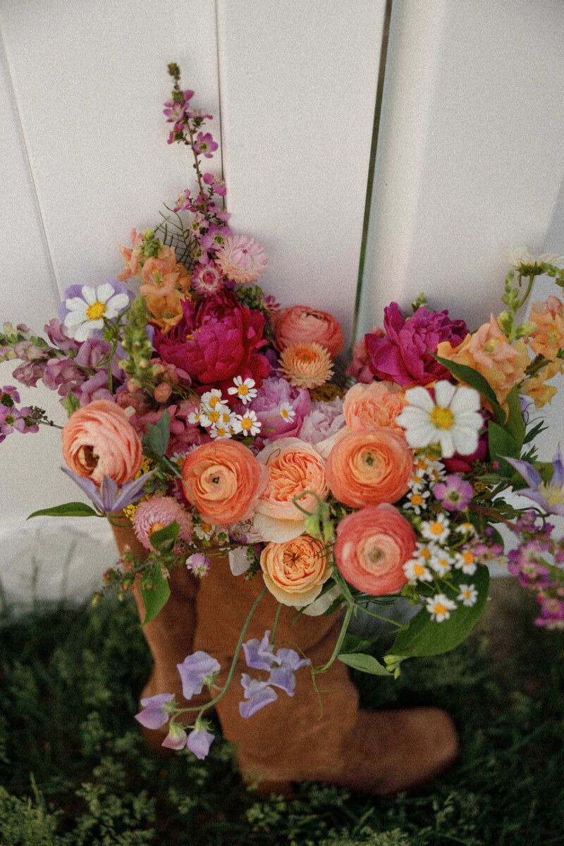 Bright and colorful summer wedding florals photographed by Jamie Tobin Photography