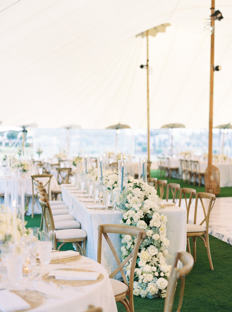 Luxury sailcloth tent wedding at Alys Beach featuring timeless coastal design elements and refined neutral details.