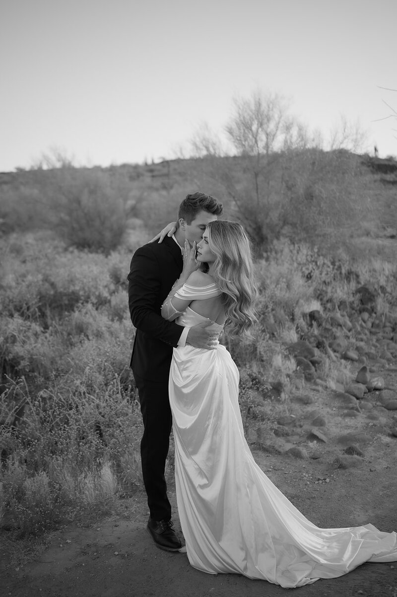tuscan themed intimate elopement photo of bride and groom kissing
