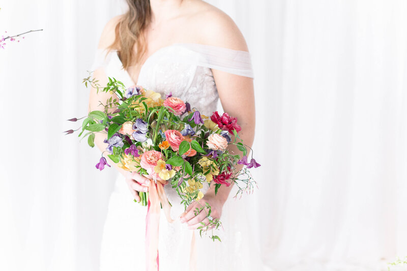 Bride holding bouquet taken by Kansas City Wedding Photographer
