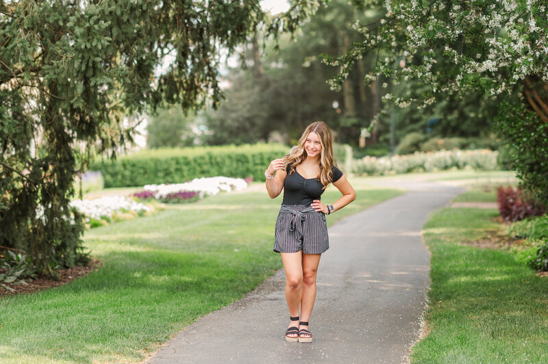 senior girl standing on path at hershey gardens by york pa photographer