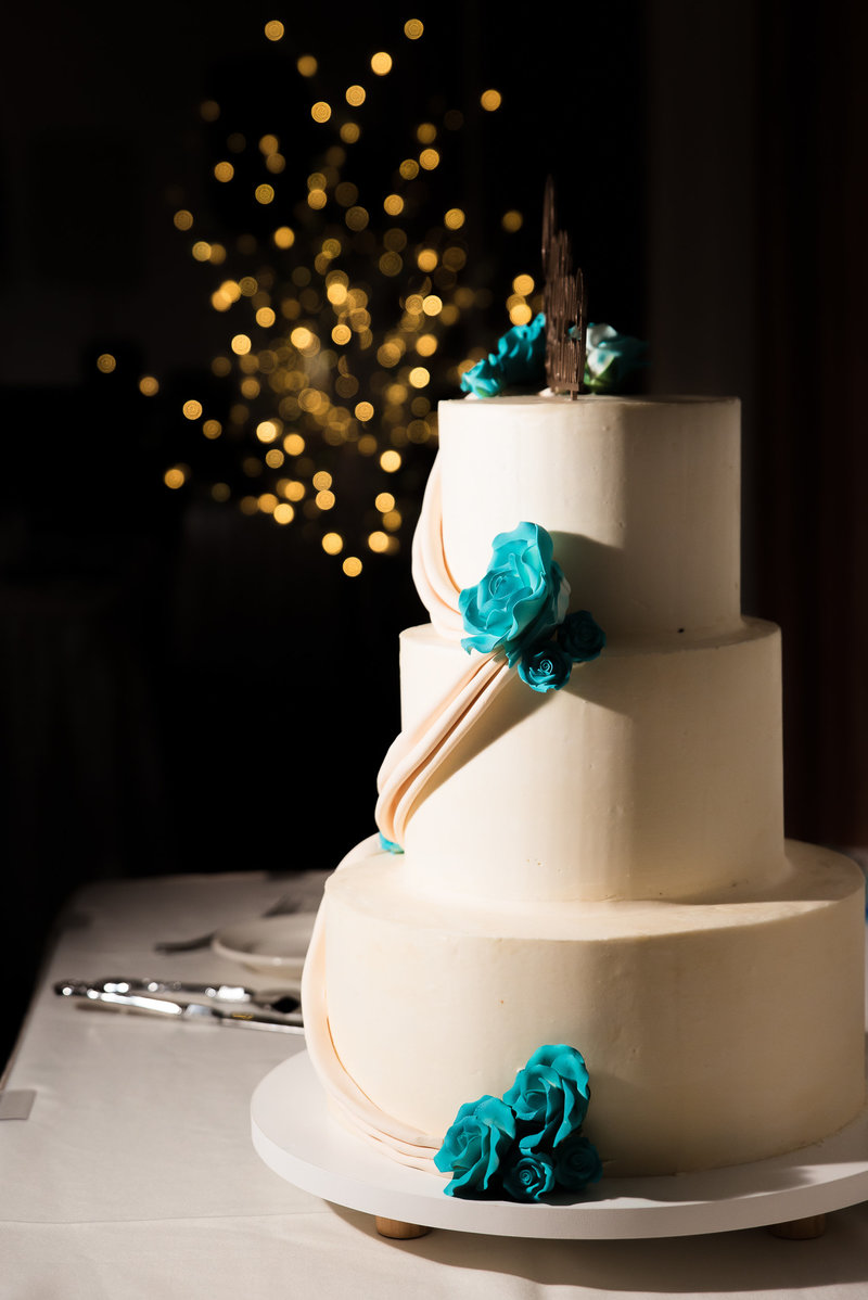 Wedding cake with Christmas Tree Bokeh lights in the background