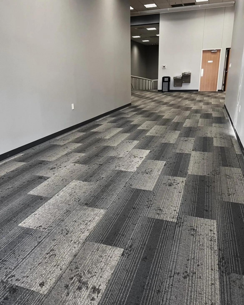 Gray patterned carpet in a commercial building.