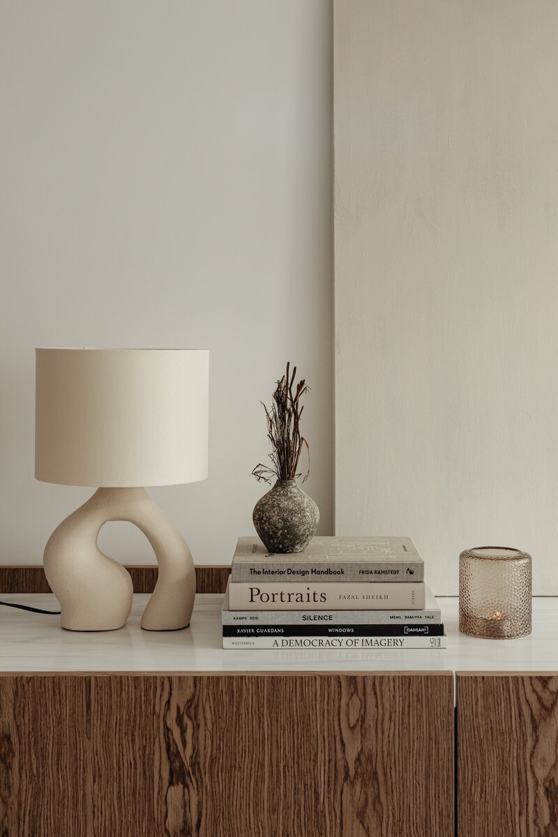 kaboompics_ceramic-lamp-styled-on-a-commode-with-a-stone-top-28398