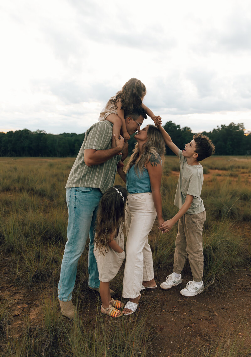 family posing in the desert