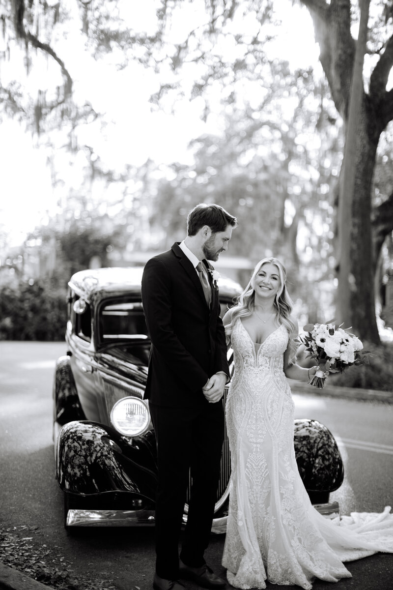 Bride looking out the window, captured in an emotional moment before the wedding ceremony by Super 8 wedding videographers, Tyler and Makenzie Films.