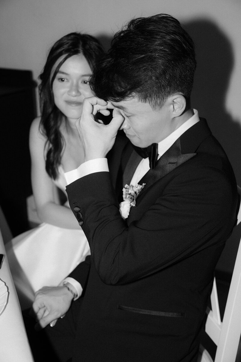 Luxury wedding in Europe – sophisticated bride in a modern wedding gown and groom in a timeless suit.