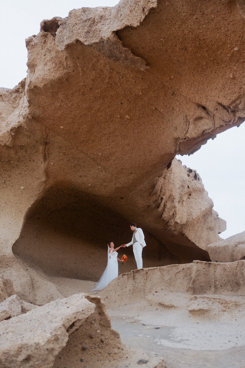 bride and groom embracing