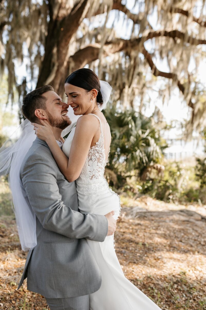 indie west photo portfolio imager of groom holding bride on wedding day