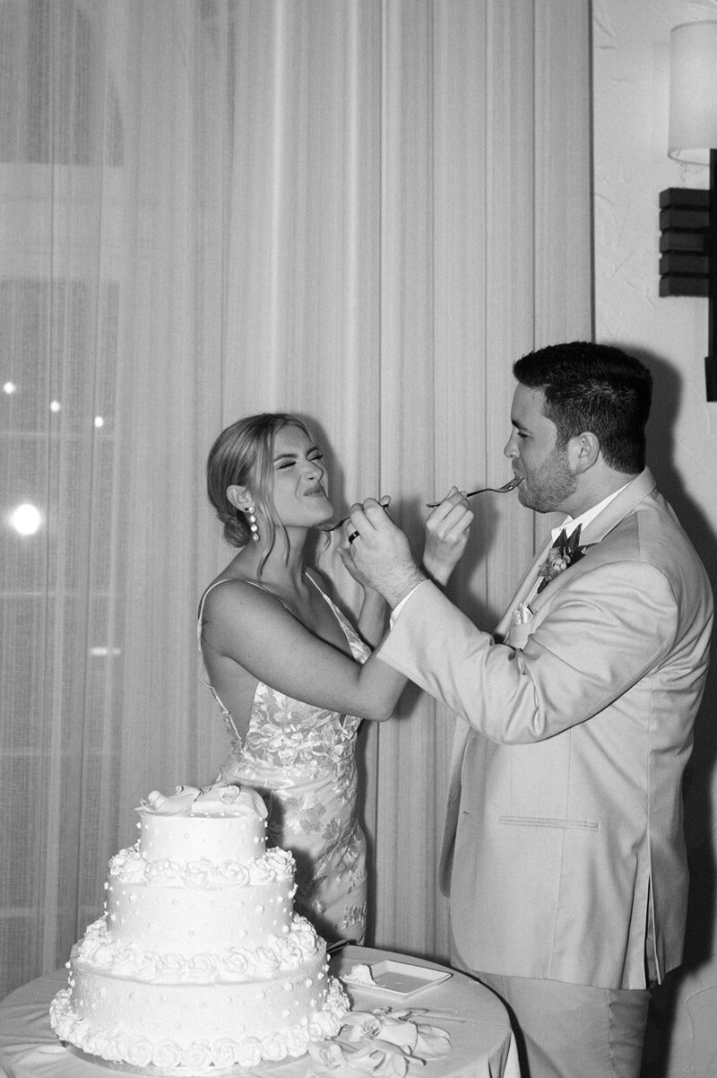 Wedding couple tasting cake