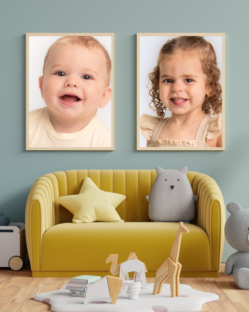 siblings preschool children smiling in living room artwork
