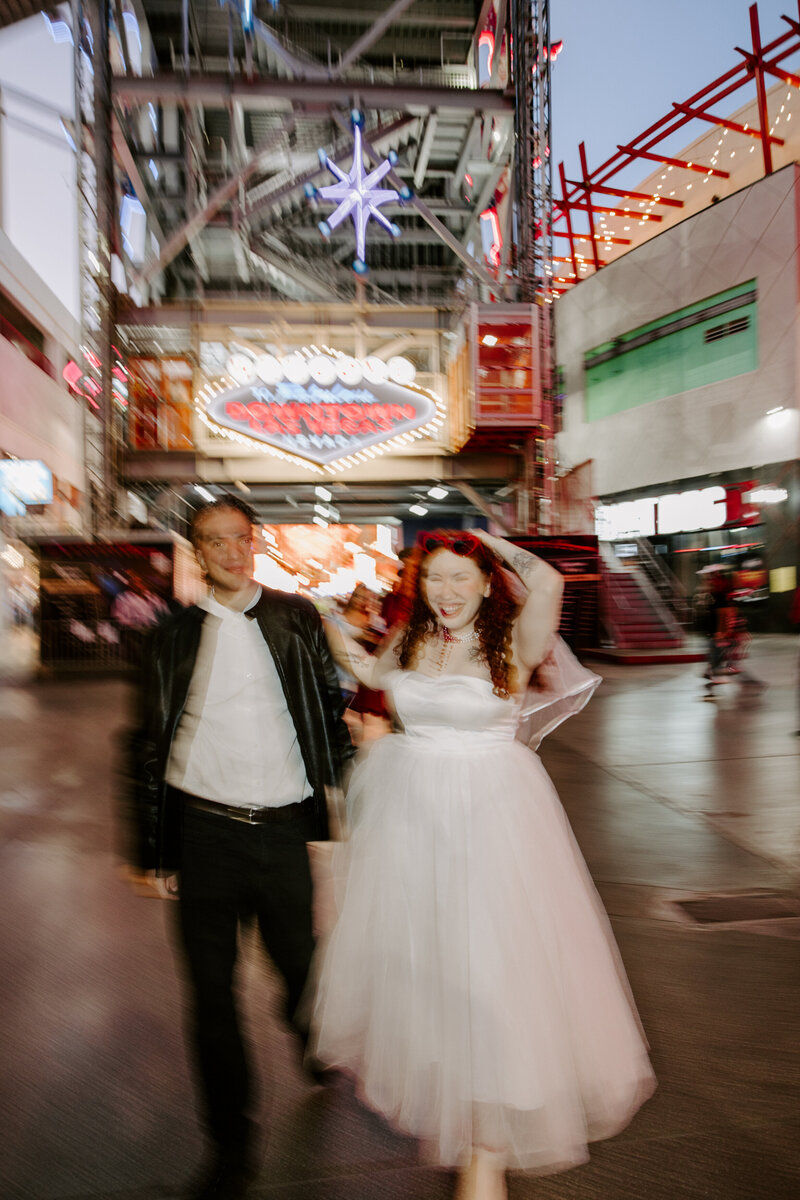 A couple on their elopement day walks down Fremont