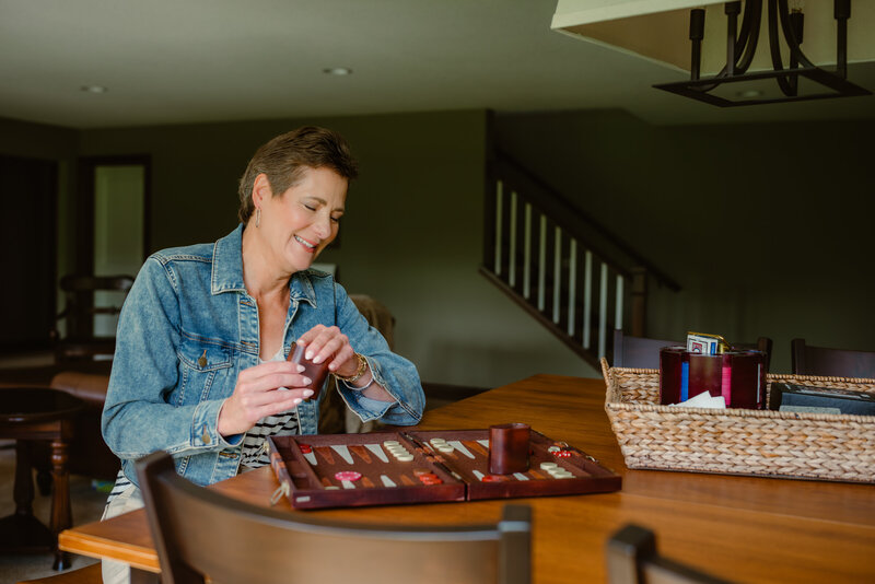 Carolyn captured smiling naturally during her online dating photography session in Minneapolis, reflecting her true self for real connections.