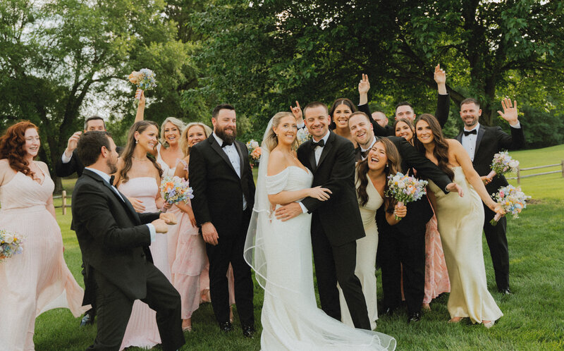 wedding party posing for portraits in philly pa