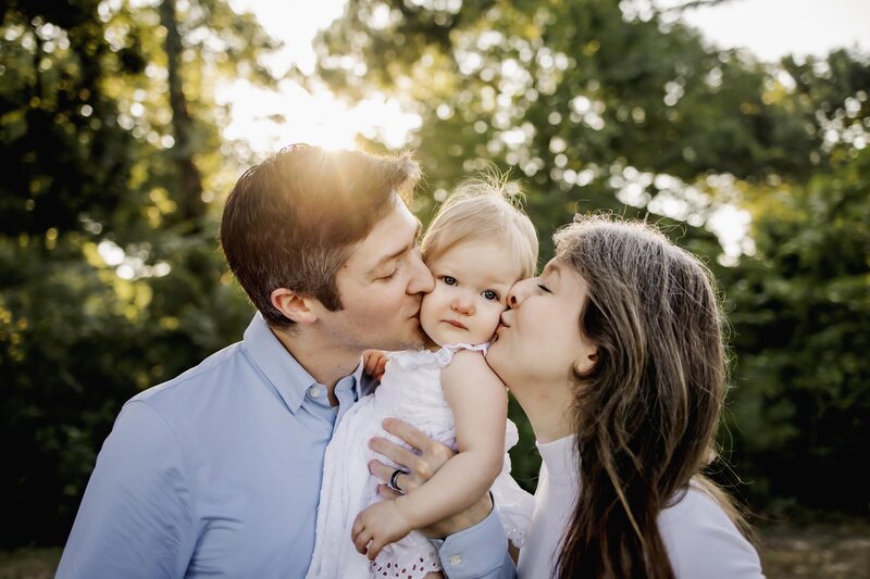 family of three at a cake smash session