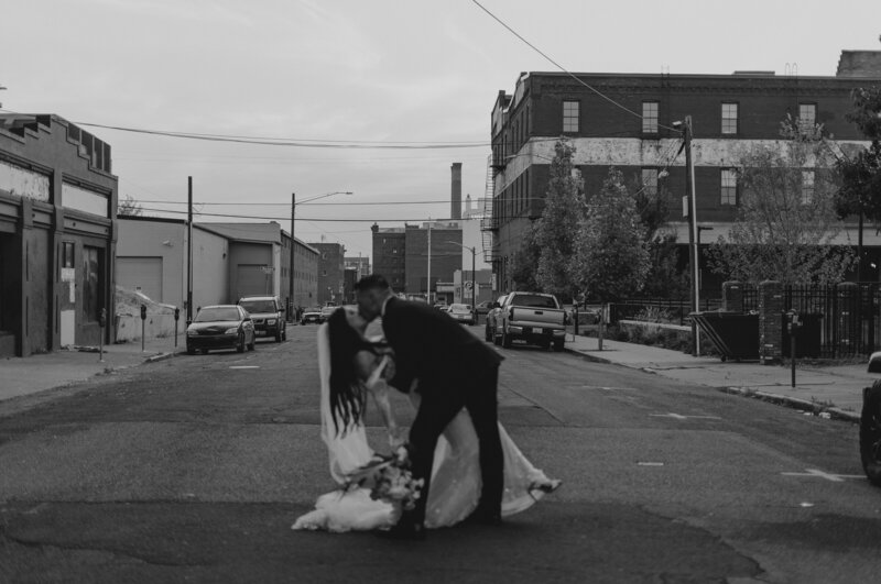 Bride & Groom Kissing in City Street - Darby & Garrett | Timbers on Pacific Wedding Spokane Washington