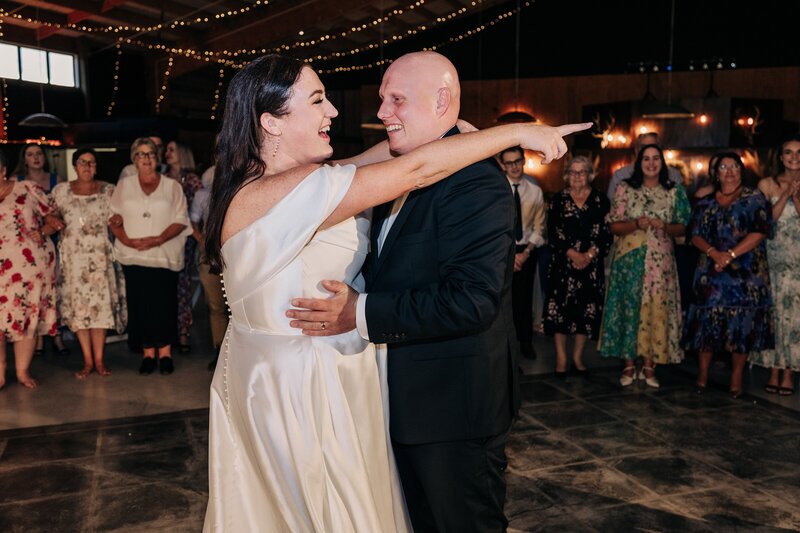 bride and groom having first dance in reception barn at bangor farm in darfield