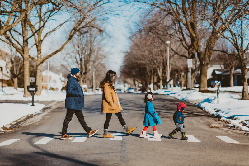 Family of 4 walking through Naperville Neighborhood.