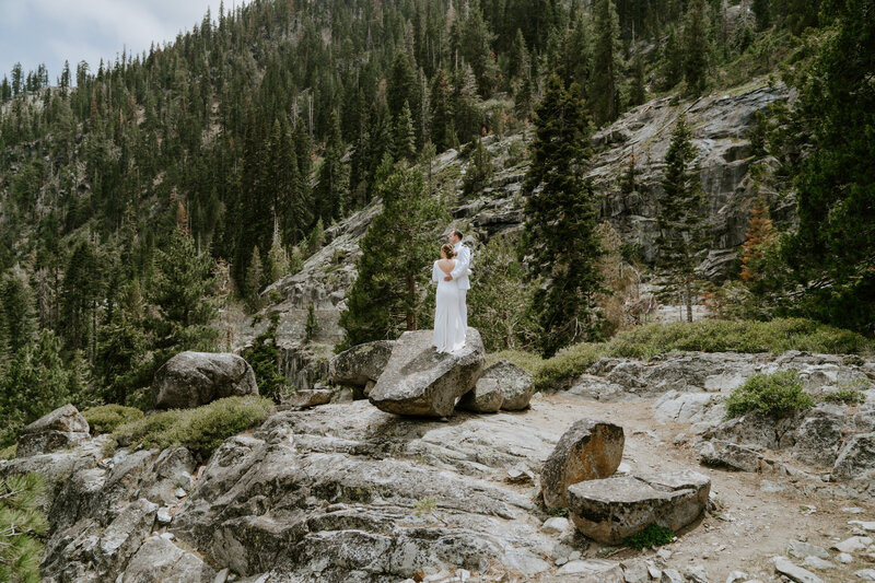 bride posing on mountain