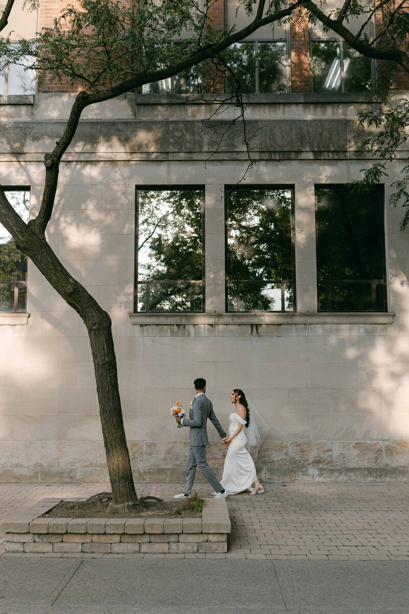 a groom and bride kissing in their marriage