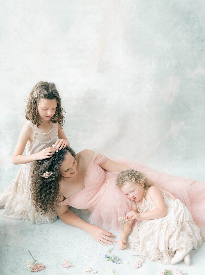 Maternity session at home with toddlers, captured by a Newborn Photography Salt Lake City professional.