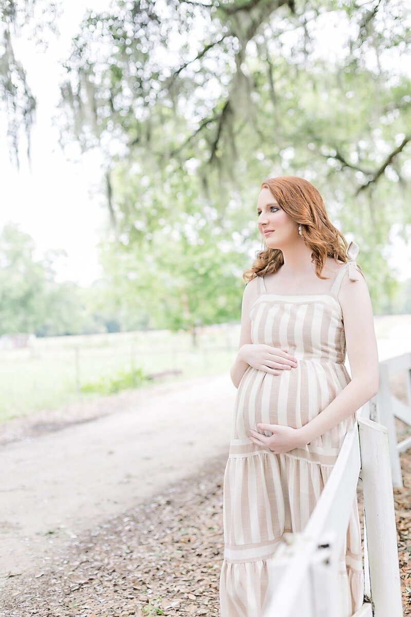 savannah maternity photography portrait of mom holding her pregnant belly