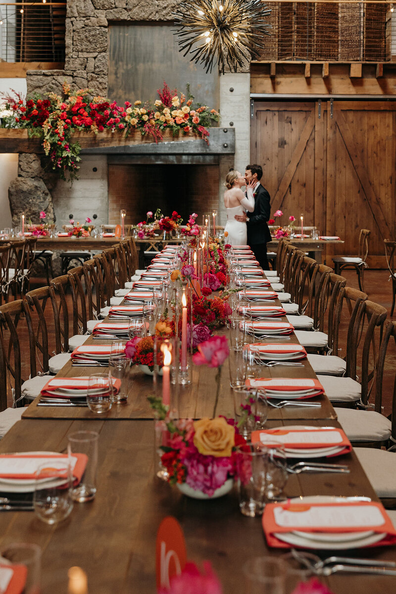Fireplace floral installation with bold spring blooms