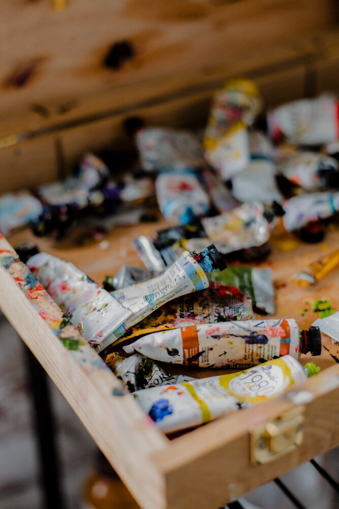 interior photography of an artist's paint supplies