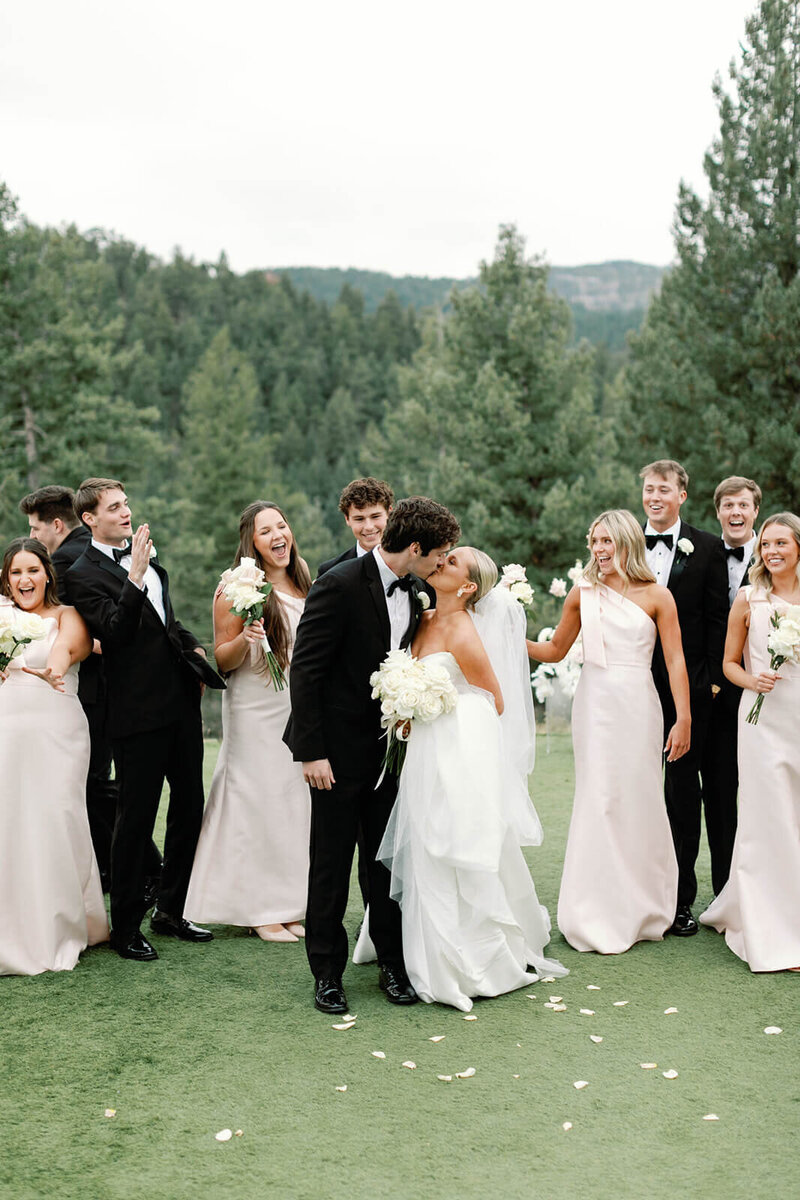 Bride and groom holding hands