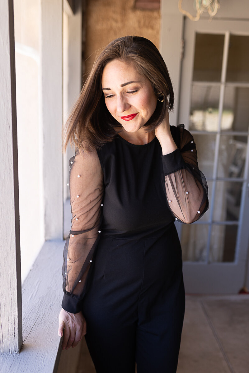 Professional headshot of CEO Alia Merrill, smiling at camera