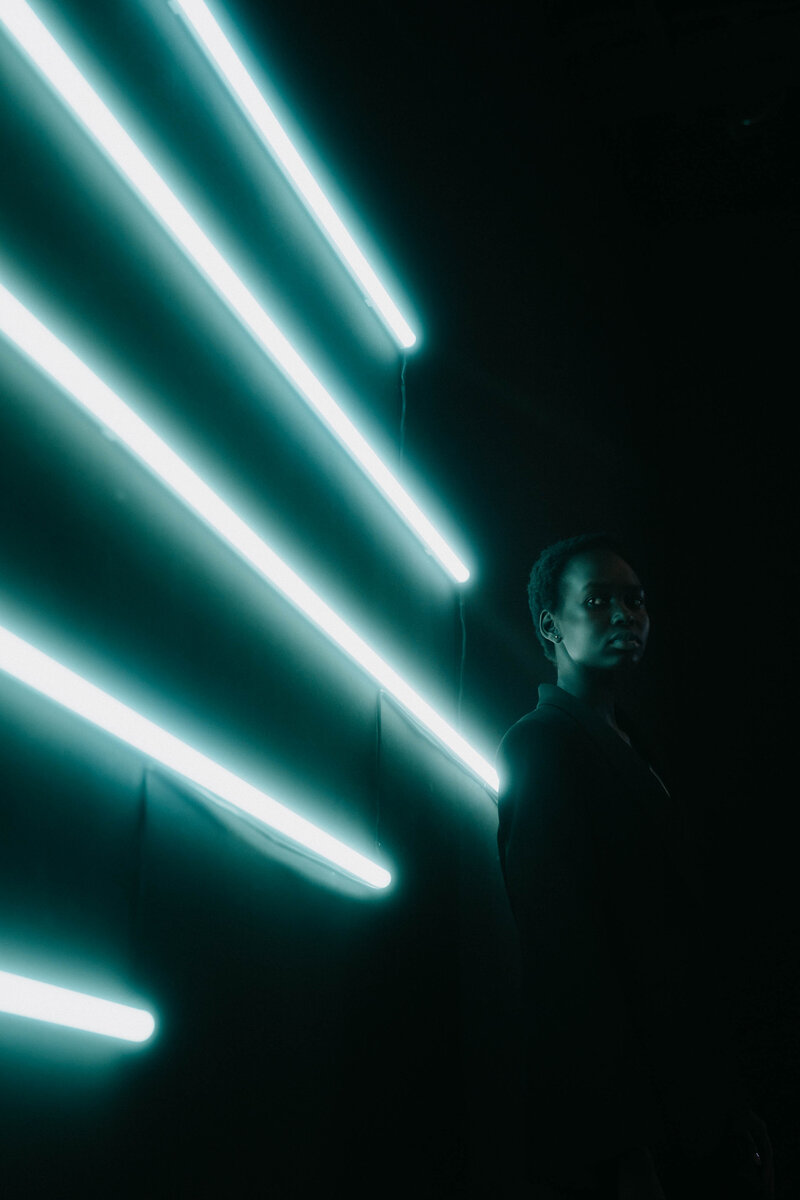 contemporary shooting in Berlin Roberto Panciatici Studio neon light portrait