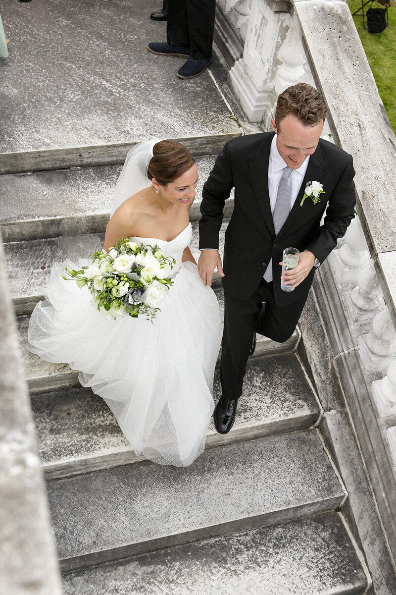 bride and groom walking down the stairs at The Mount