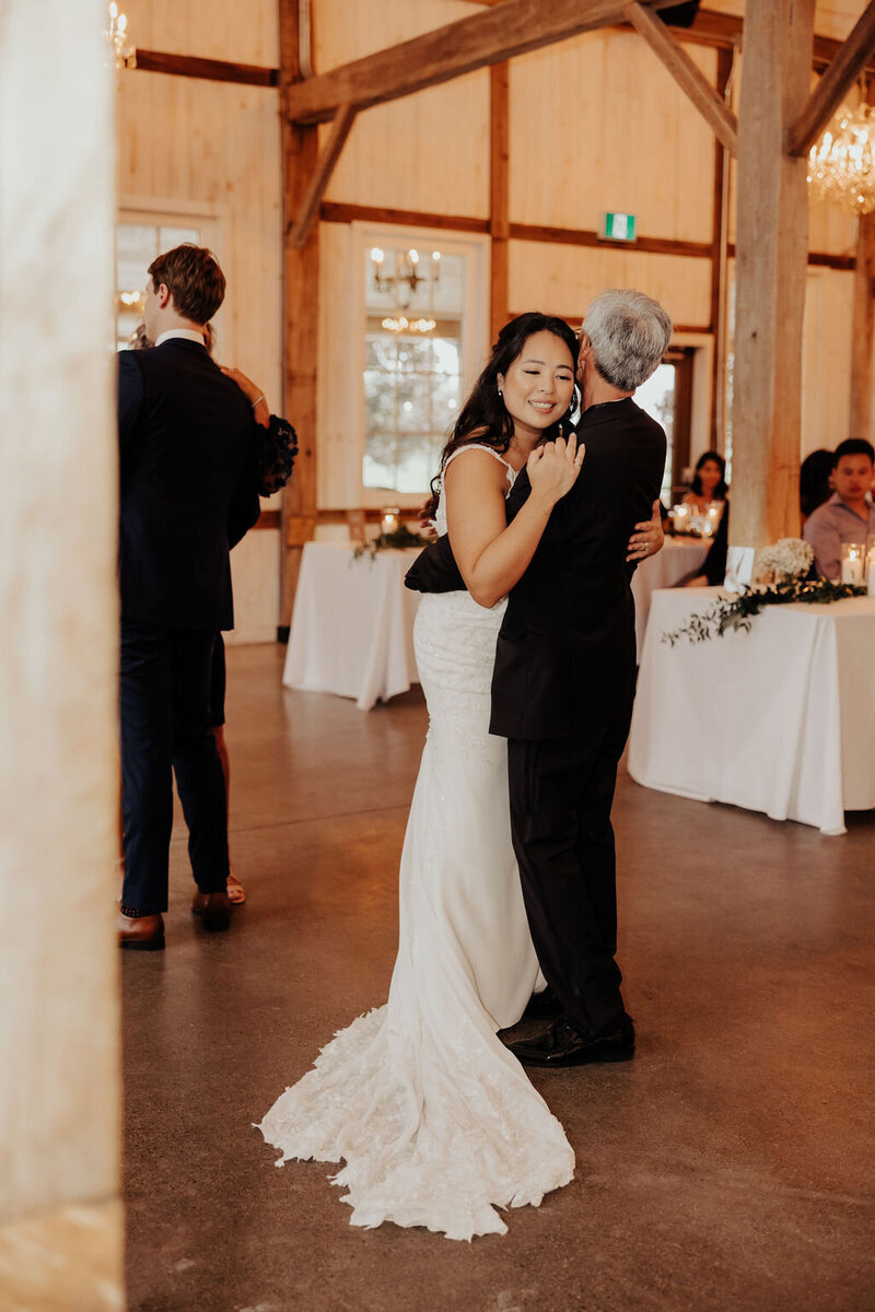 Bride hugging dad