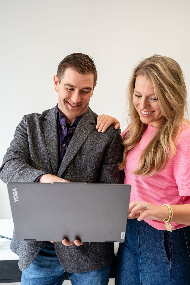 Owners working together on computer