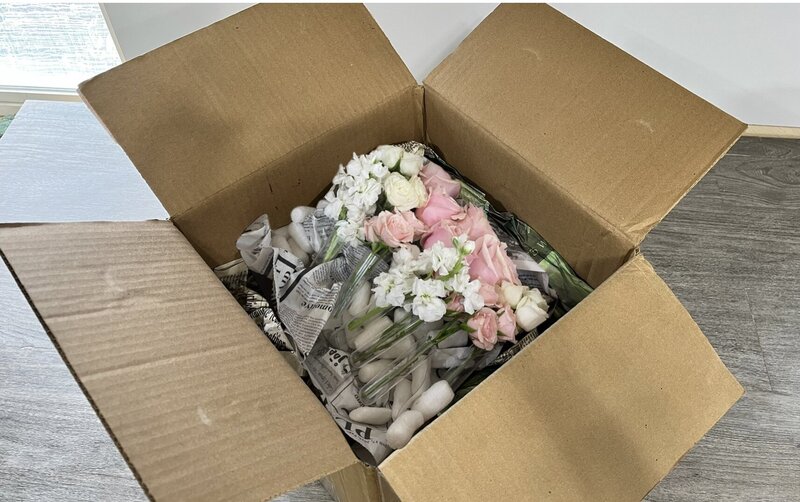 fresh flowers in water tubes ready to be shipped