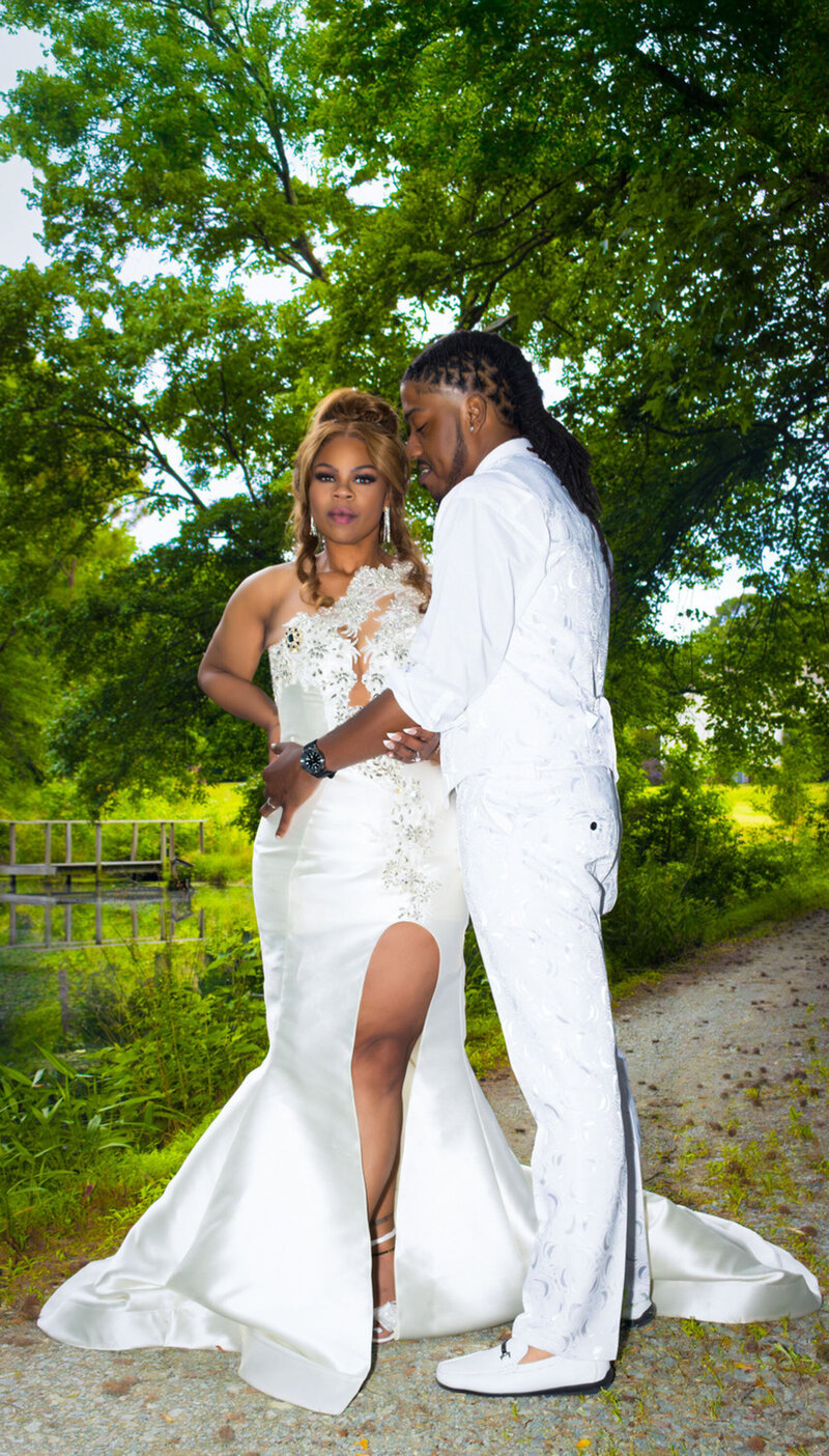 Couple posing on a forest path