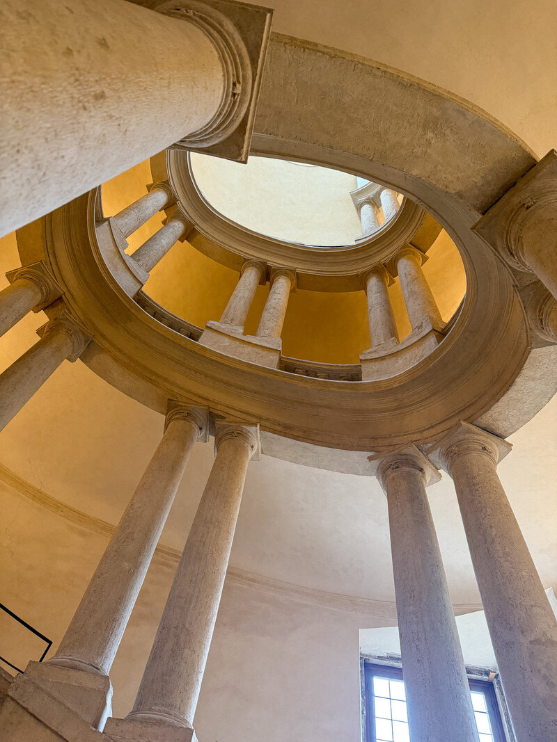 Stairway view of iconic columns at Palazzo Barberini in Rome, Italy