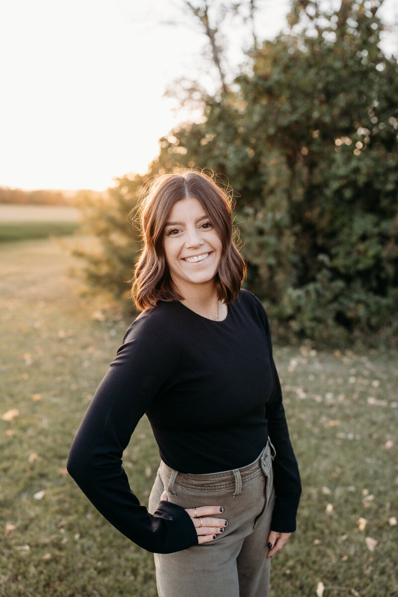 Lady in hat smiling for portrait photos