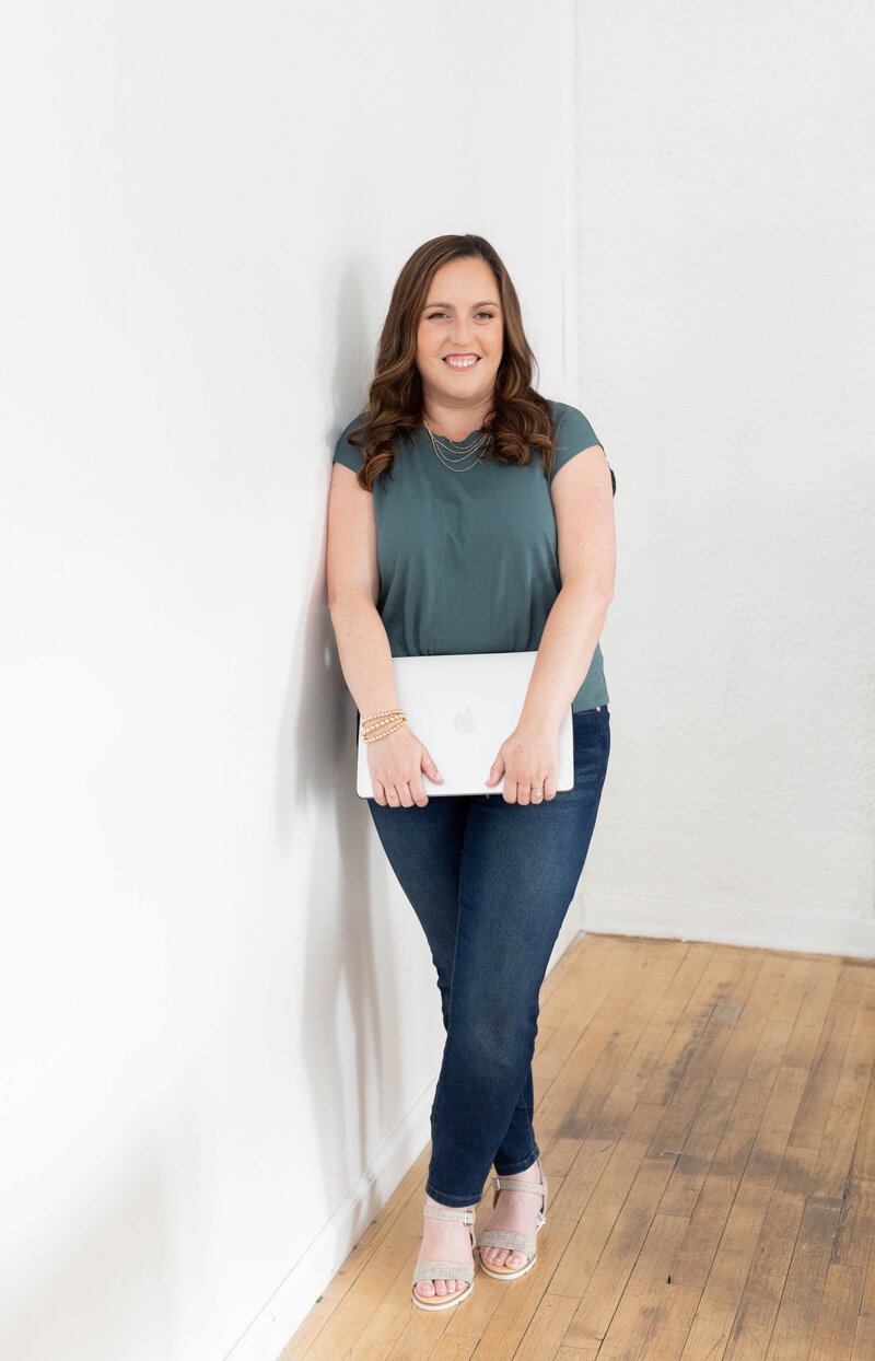 female business owner looking at phone