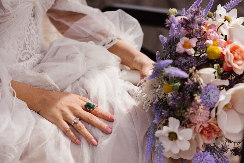 a bride with flowers and ring
