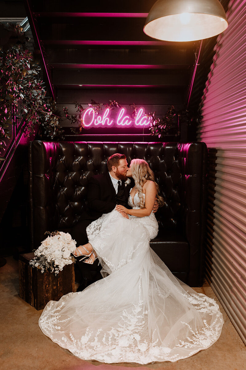 neon sign in wedding photobooth