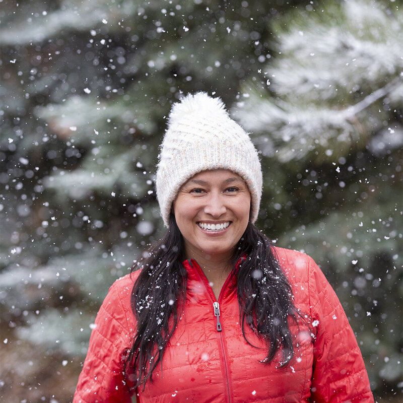 Embark on a vibrant journey with our CEO, a visionary leader embracing the essence of nature, wellness, and healthy living. Picture her in a rainbow knitted hat, radiant orange coat, jean gray pants, and stylish leather booties, seated atop a new cactus grey Ford Bronco nestled against the backdrop of Colorado's forest and snowy floor. Her attire reflects her dynamic spirit and commitment to individuality, while the serene natural setting epitomizes her passion for outdoor adventure and holistic well-being. As she sits amidst the tranquil beauty of nature, she embodies a harmonious blend of leadership and mindfulness, inspiring others to embrace a balanced lifestyle. Join her on a journey of discovery and empowerment as we navigate the intersection of business and the great outdoors, guided by her vision of data driven success.