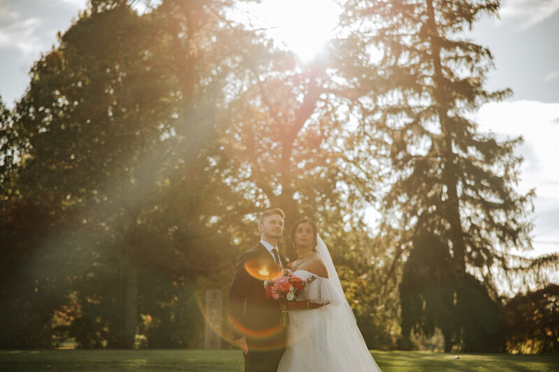 Bride and groom celebrating just after their wedding ceremony at Spring Mill Country Club