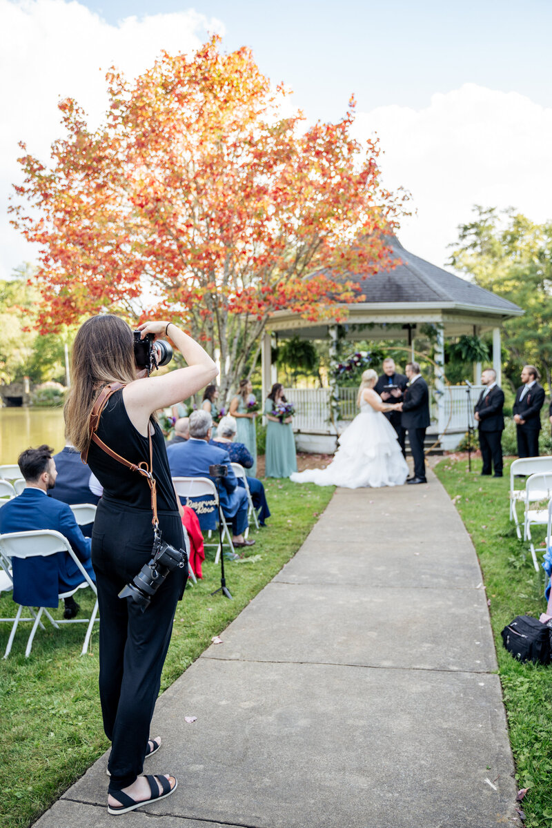 bride and groom cutting a cake at the Durham Hotel